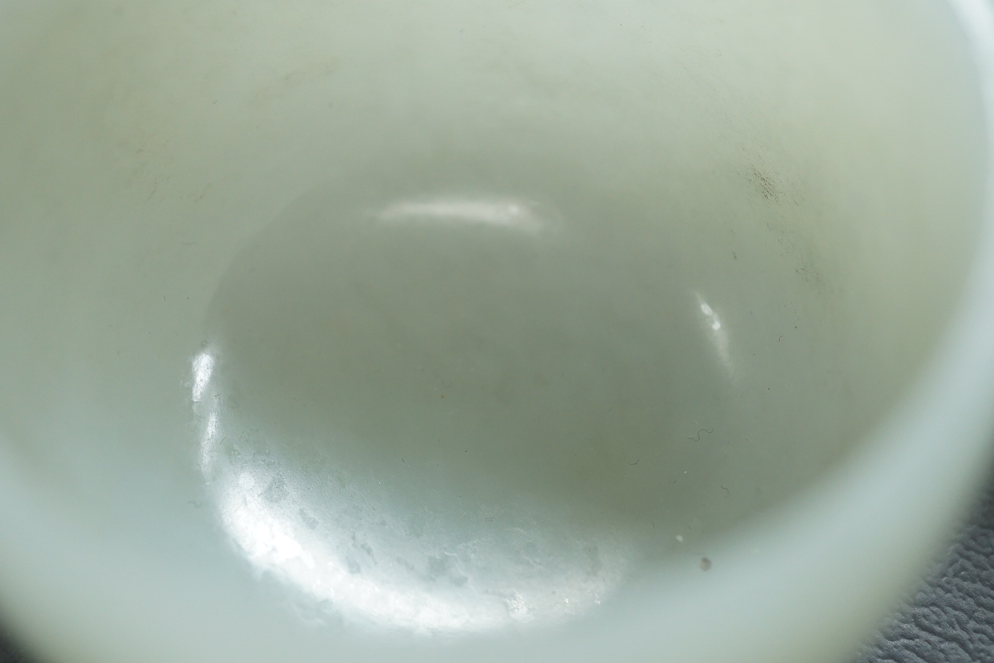 A pair of Chinese white jade cups, Qing dynasty or later